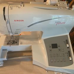 Singer Quantum Futura CE-200 Embroidery Sewing Machine with software, instruction manual, and all accessories shown 