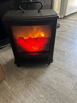 Electric fire place heater