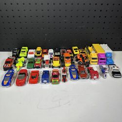 Lot of 33 Diecast Toy Cars Trucks Hot Wheels Kelloggs Monster Truck Police Semi