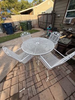 Outdoor patio table and chairs