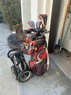 golf clubs and walker