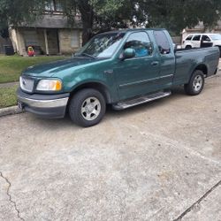 99 FORD TITULO LIMPIO V-6 A/C  $5,500 127 000 MILLAS