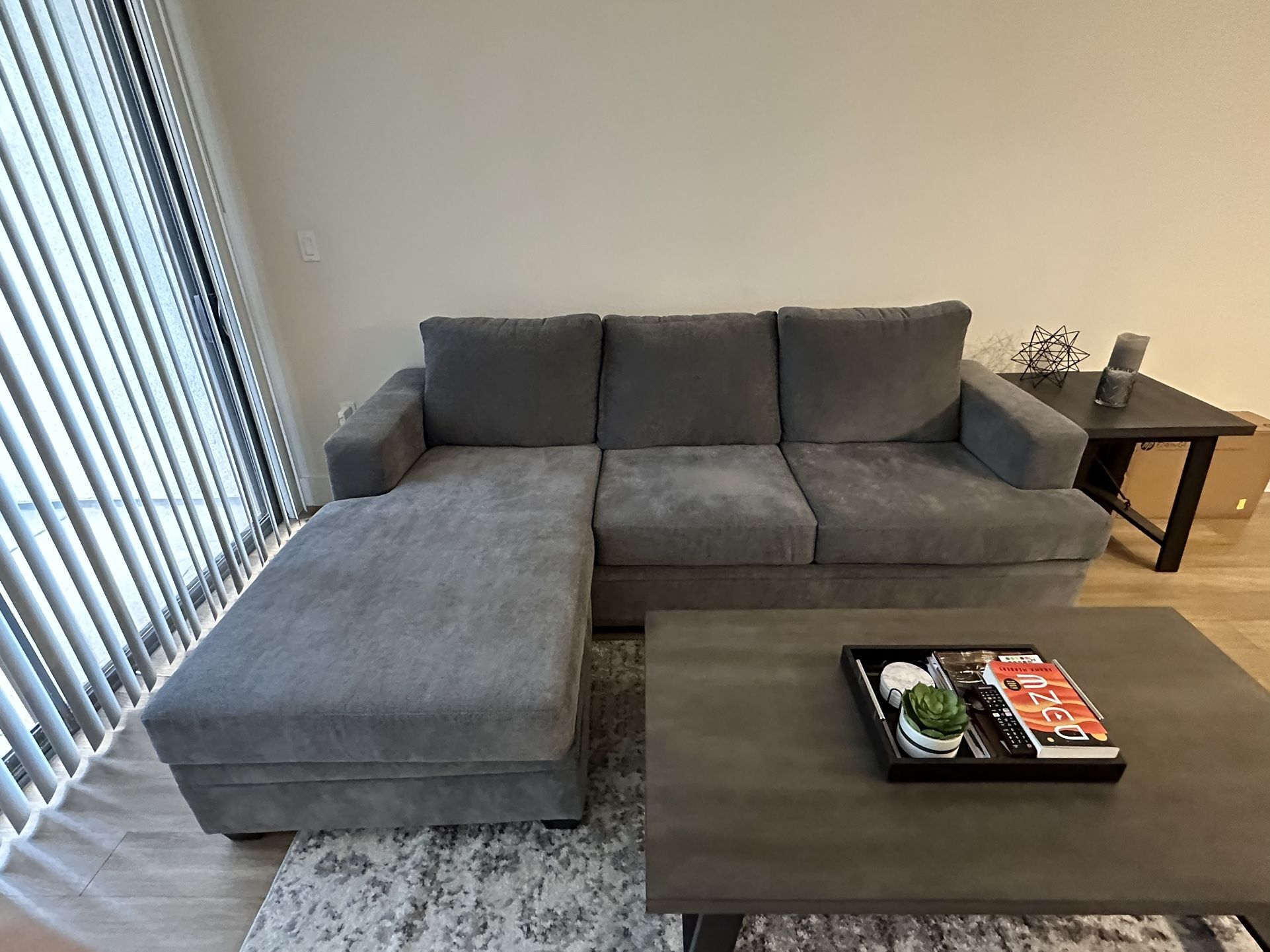 Living Spaces 97 Inch Sofa With A Reversible Chaise for Sale in