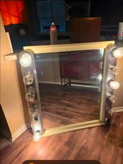 Large mirror with lights