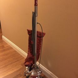 Vintage Kirby vacuum with attachments