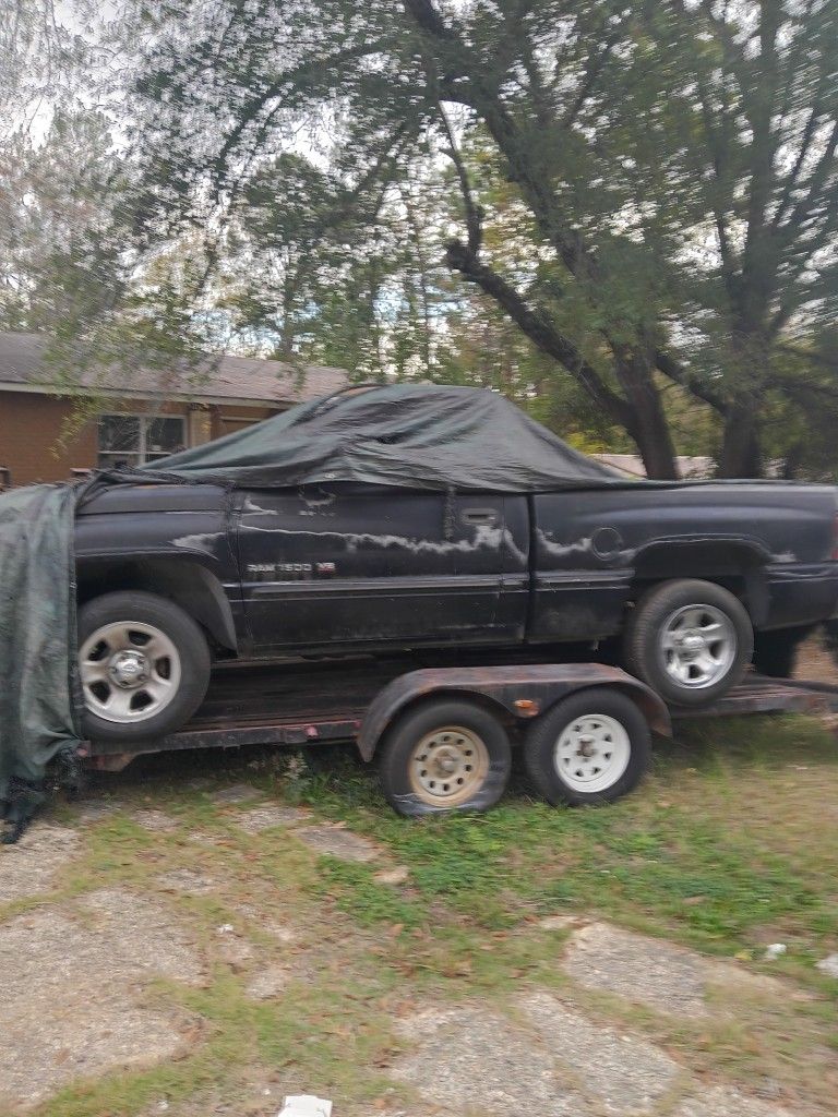 DODGE RAM WITH CAR HAULER N ALSO FARM TRACTOR WITH TRAILER 