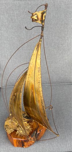 John Dermott brass sailboat sculpture