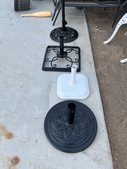 $25 each Umbrella Stands, $10 each glass sideTables