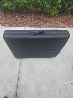 Massage table