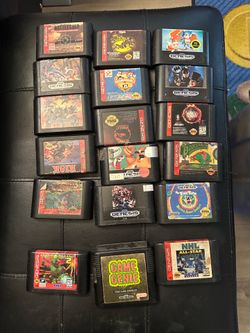 Sega Genesis Game Cartridge Lot with Game Genie