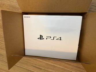 PS4 Slim Console New Open Box.              A23