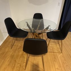 40” Diameter Glass Table and 4 chair dining set