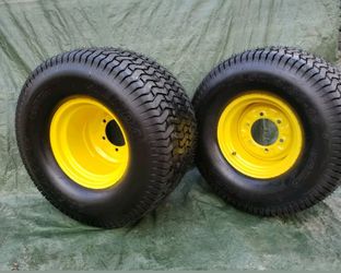 Pair of 26.5x14.00-12 Kenda K507 Turf Lawnmower Tires on a JD yellow 6-lug wheel