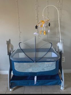Brand new bedside crib