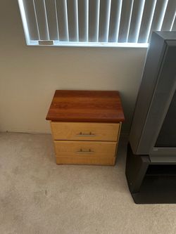 Complete bedroom set, mattresses included, $300. Free delivery.