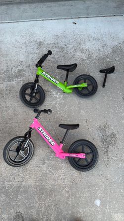 Strider Bike - pink or green , one for $75 both for $120