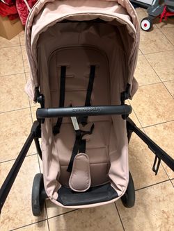 Blush color bassinet stroller