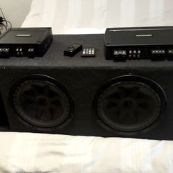Two 10” Kicker Speakers in Ported Box With 2 Amps And Remote. 