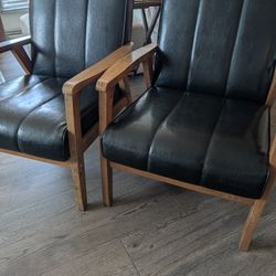 Pair of Mid-Century Modern Black Faux Leather Accent Chairs