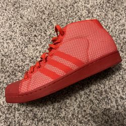 Red Adidas high top 