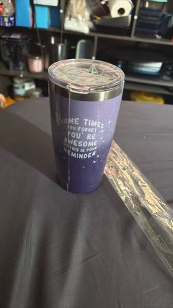 Purple Tumblr with straw