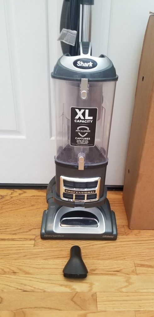 SHARK VACUUM WITH ATTACHMENTS  , AMAZING POWER SUCTION. , WORKS EXCELLENT.   