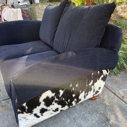 Loveseat With Cow Hide On Both Sides