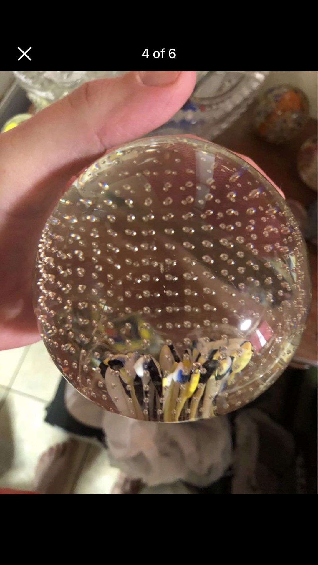 Vintage bullicante controlled bubble glass paperweight with flowers inside