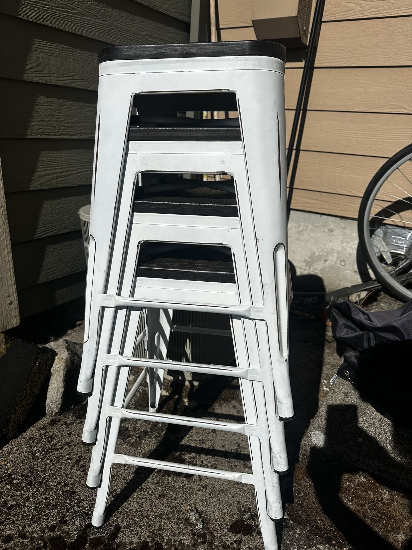Four White Stools