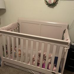 Pink baby crib