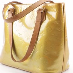 A 1999 Louis Vuitton Paris Monogram Vernis coated leather Columbus tote in yellow. Made in Spain.