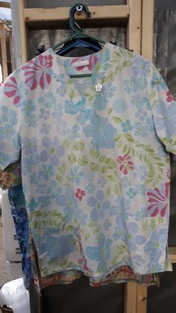 Small to medium size scrub shirt