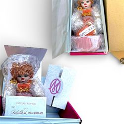 Marie Osmond Rag a Muffin "Pumpkin Spice" porcelain doll,