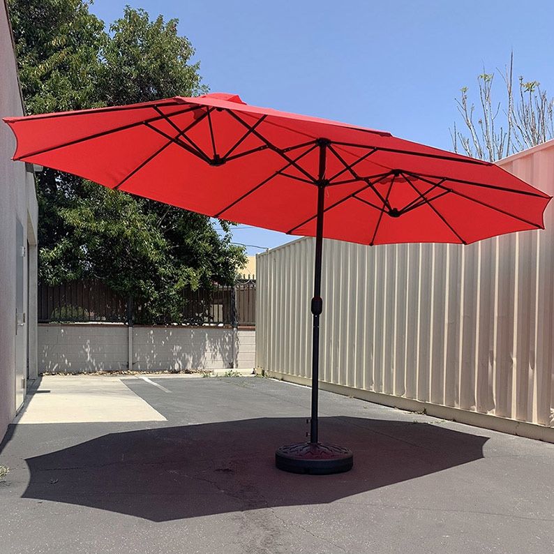 $130 (New in box) Large 15ft double sided outdoor umbrella w/ 65 lbs plastic weight base (red/gray)