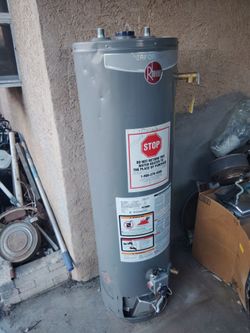 RHEEM 29 GALLON WATER HEATER FREE INSTALL & HOSES