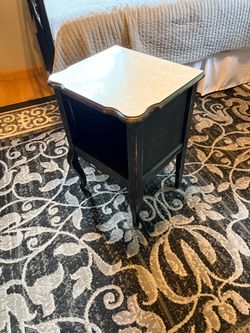 Antique distressed little table for a night stand or display table.