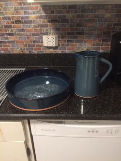 Ceramic pitcher with tray