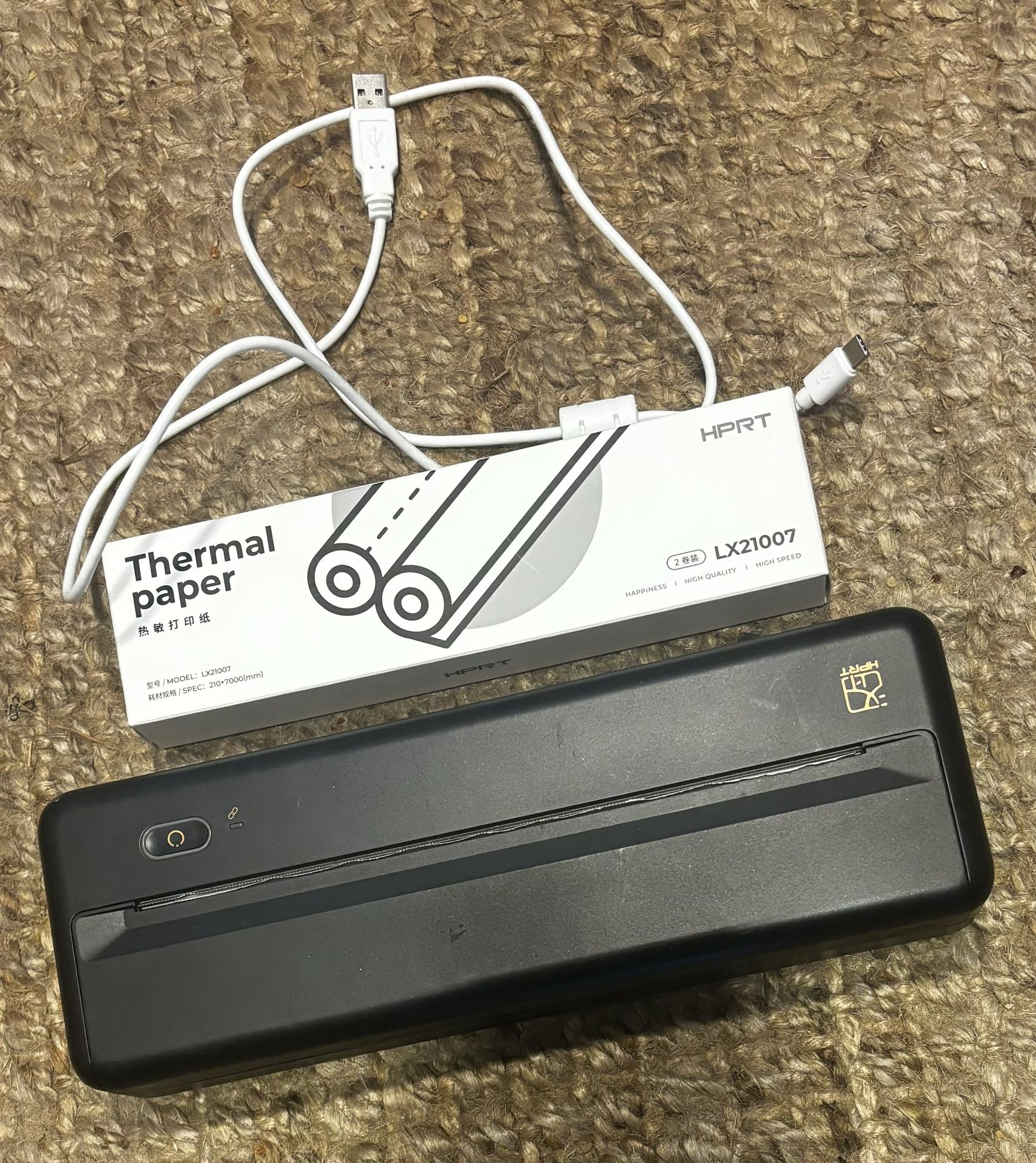 Portable Laser Printer used twice with new paper inside and an extra thermal paper roll