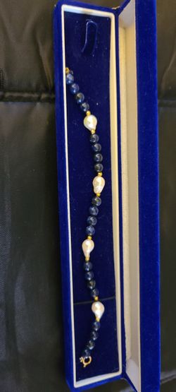 Mikimoto pearls and lapis lazuli