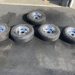 Chrome Trailer Wheels And Tires (5) One Wheel Minor Damage. 