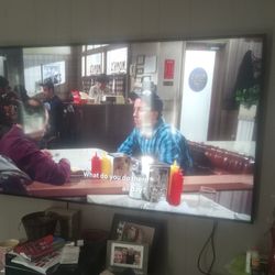 Seventy five inch flat screen t v works good