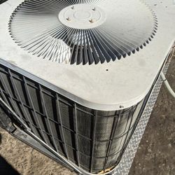 Goodman 3.5 ton AC condenser  straight Cool  R22 refrigerant.  
**Fully charged**