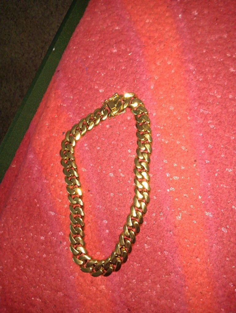 Selling Ryme Stone Watch , And A Stainless Steel Gold Cuban link 