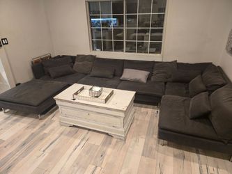 Large Dark Gray Modular Sectional Sofa + Ottoman – 4 Pieces with pillows