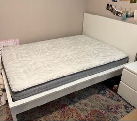White IKEA full size bed with mattress and  nightstand