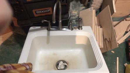 Sink with new faucet