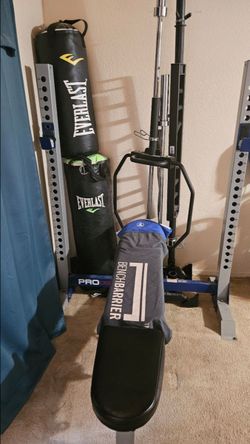 Weight bench with attached squat rack