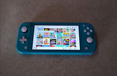 NINTENDO SWITCH LITE Loaded with 7000 Games