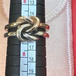 James Avery 
A timeless expression, the knot signifies two people have become one, bound together by their love.

Specifications
Sterling Silver and 1