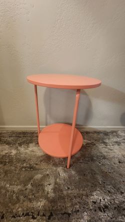 Three colorful round side tables